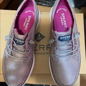 Sparkling gray Sperry shoes.